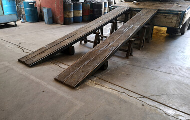 Wood Ramp down  to load for moving big machine and transport goods product and raw material.