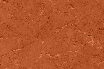 Saturated dark orange brown colored low contrast Concrete textured background with roughness and irregularities. 2021, 2022 color trend.