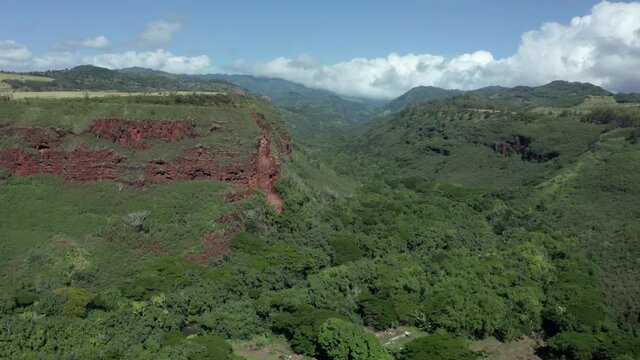 Hanapepe Valley Lookout in aerial drone shot. Beautiful colorful canyon mountain landscape famous tourist view point along the highway