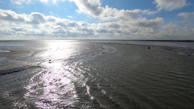 The Wadden Sea at low tide at the marina of Schiermonnikoog in the Netherlands
