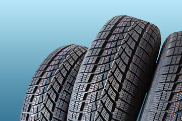 winter tyre cover on Lights on blue and snow background