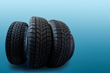 winter tyre cover on Lights on blue and snow background