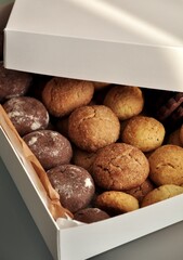 different cookies in a white box 