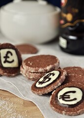chocolate cookie coins with sugar