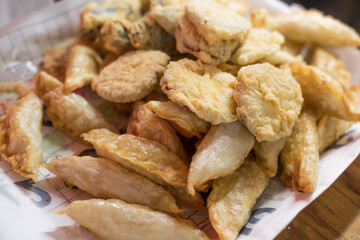Vegetable fritters are a popular tempura in korea.