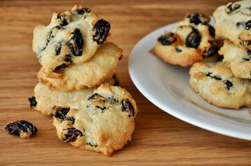 cookies with raisins on a wooden background