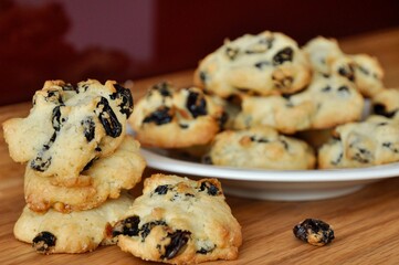 cookies with raisins on a white plate