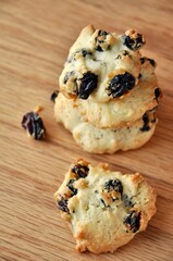 cookies with raisins on a wooden background