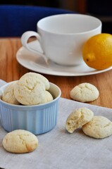lemon cookies with a white cup on the background