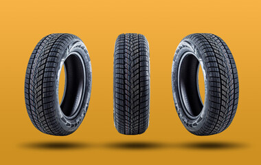 Car tires isolated on yellow background