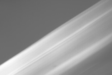 Diagonal shadows on a white background.