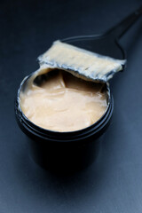 Home hair care. Hair mask in jar. Glossy hair. Health. Hair brush in jar. High quality photo