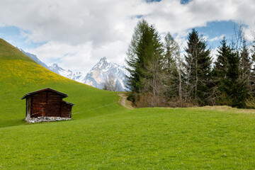 timber hut in front of Aletsch glacier valley