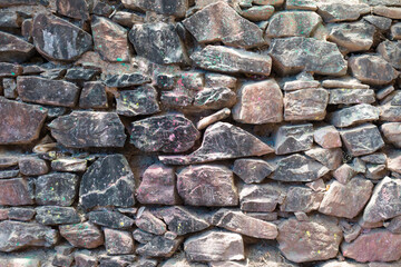 Grunge background stone wall texture rock.