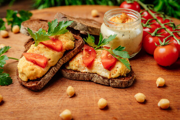 hot sandwiches with egg, cheese and tomatoes, herbs and garlic