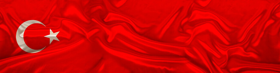 long panorama of the national flag of the state of Turkey on beautiful silk, the concept of tourism, emigration, economy, politics, civil rights and freedoms