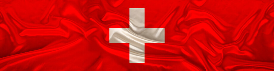 long panorama of the national flag of the state of Switzerland on beautiful silk, the concept of tourism, emigration, economy, politics, civil rights and freedoms