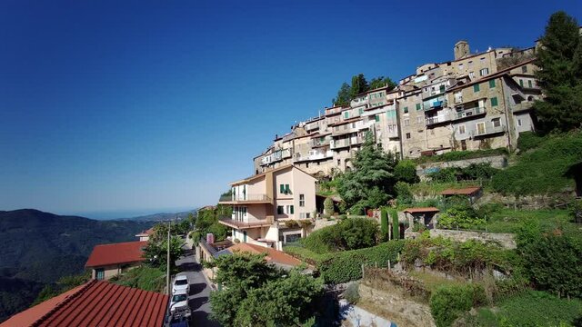 Bajardo village clinging to the mountainside, inland Liguria, Italy
