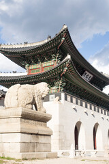 Fototapeta premium Gyeongbokgung palace landmark of Seoul, South Korea. roof with sky and cloud.