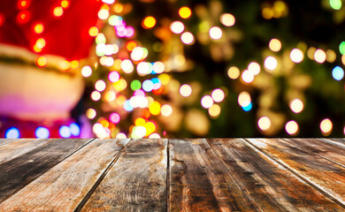 Empty of wood table top with blurred light gold bokeh abstract background.