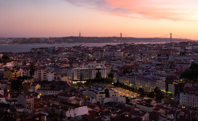 Fototapeta na wymiar High panoramic view of Lisbon downtown at sunset in summer