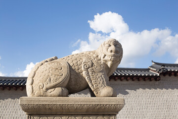 Stone Statue of Haetae and Gwanghwamun Gate in Seoul, Korea.