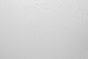The concept of raindrops falling on a gray background Abstract wet white surface with bubbles on the surface Realistic pure water droplet water drops for creative banner design