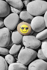 Smiley face painted on the stone