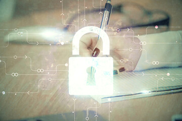 Double exposure of hands making notes with lock icons. Concept security and protection of data