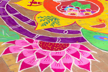Colorful Designer Traditional Cultural Indian Rangoli Made On Floor With Colorful Powder in Festival