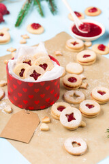 Traditional Austrian christmas cookies - Linzer biscuits filled with raspberry jam.