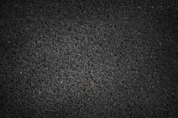 Dark asphalt texture. Road abstract background.
