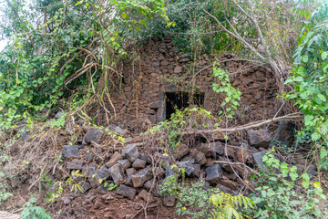 The stone masonry wall of old traditional hainan fisherman village house