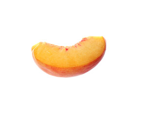 Fototapeta na wymiar Slice of ripe peach isolated on white