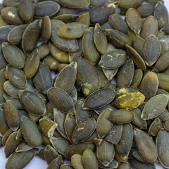 Close up of pumpkin seeds isolated on background