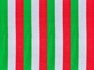 Close up of ribbon with the colors of the Italian flag