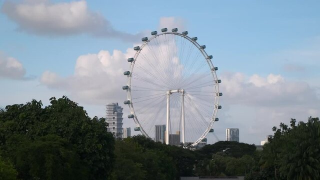 Singapore Flyer And Green City Scene