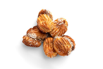 Profiteroles with condensed milk isolated on white background.