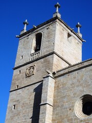 Fototapeta na wymiar tower with coat of arms and pinnacles