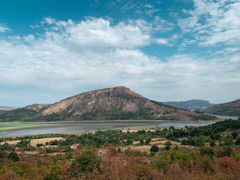 Panoramic view of the ancient Monyak fortress  located on a hill on the shore of the dam Studen Kladenets near Kardzhali, Bulgaria