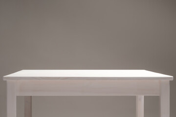 wooden table on a dark gray background