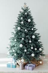 Christmas tree Christmas decoration interior of the white room with postcard gifts