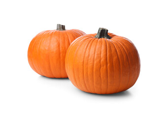 Ripe orange pumpkins isolated on white. Halloween decor