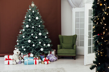 Christmas tree pine Christmas decoration interior of brown room with gifts