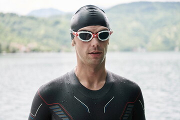 triathlete swimmer portrait wearing wetsuit on training