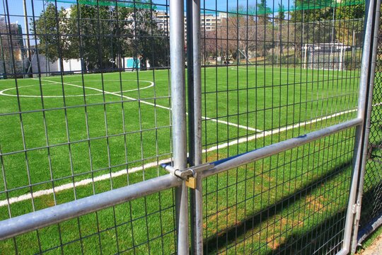 Closed 5 x 5 soccer field stadium due to coronavirus lockdown - Athens, Greece, March 17 2020.