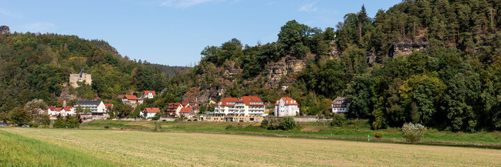 Fototapeta na wymiar Panoramic view of Elbe river sides in Elbe Sandstone mountains, resort Rathen. Saxon Switzerland. Germany