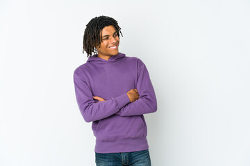 Young african american rasta man smiling confident with crossed arms.