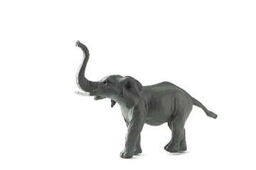 Elephant mini figure isolated on white background. Plastic animal toy, clipping path