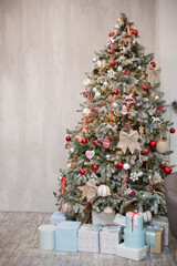 Christmas tree with decorations and gifts